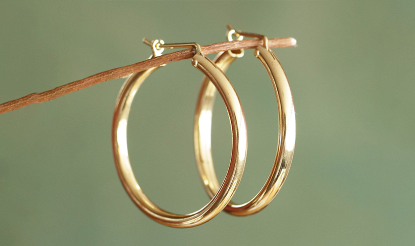 Why Hoop Earrings Deserve a Wardrobe That Matches Their Energy